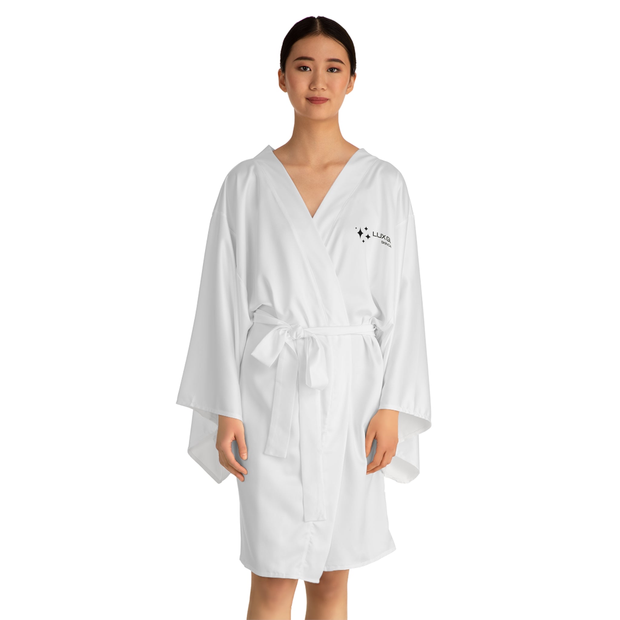 The Lux Glow Kimono Robe is designed for comfort and style, perfect for lounging at home, spa days, or poolside cover-ups. The lightweight, flowing fabric flatters various body types with a relaxed fit that drapes beautifully. The mid-length design provides ample coverage while allowing easy movement.