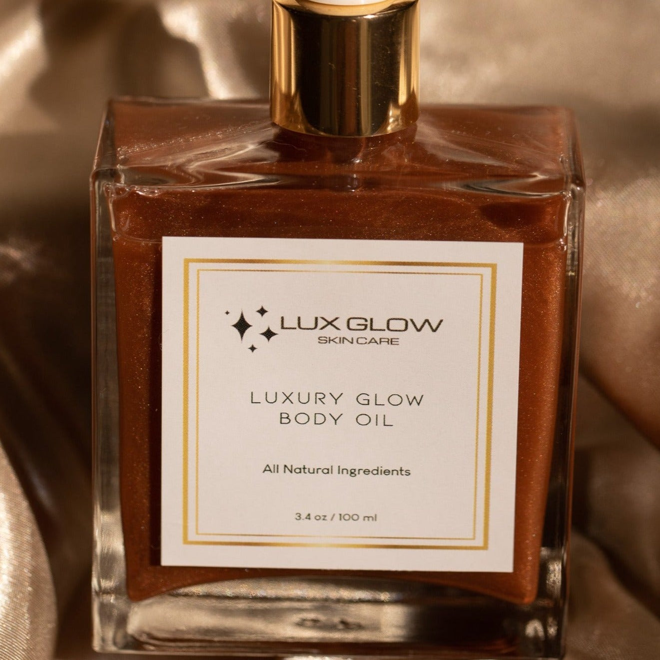 Luxury Glow Body Oil Bronzer Made with all natural ingredients, the silky oil creates an irresistible bronze shimmer, illuminating the skin for the ultimate fresh-out-the-shower product. Tempting, sexy, vibrant and nourishing to keep your skin glittering with a healthy glow. Contains Cocoa Butter, Shae Butter, Virgin Almond Oil, Warm Vanilla Oil, Soybean Oil, Sesame Oil, Safflower Oil, Mineral Oil, Vitamins A, D, & E. Handcrafted in the USA.